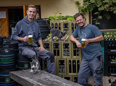 Brewery worker Johannes Marschall and Brewmaster Manuel Müller of Goikel Bräu brewery, Lohr am Main Halsbach, Bavaria, Franconia, Germany
